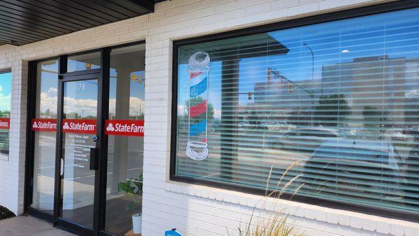 Look for the barberpole! Inside the Statefarm building and to the right: Suite B.