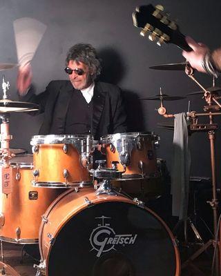 Earl Truette on House drums.