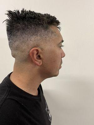 Right side with back hair so short it sticks up