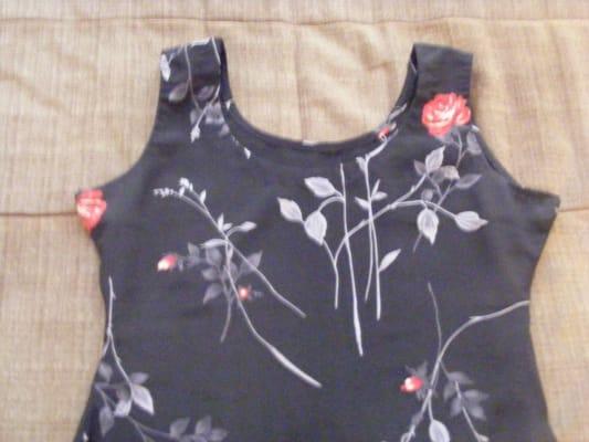 On both sides of the shirt, right under my arms the cloth sticks out like it cardboard!