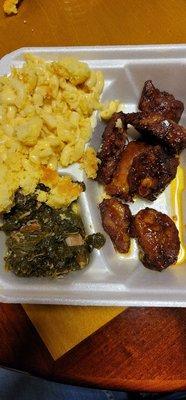 Ribs, greens, Mac and cheese, cornbread.