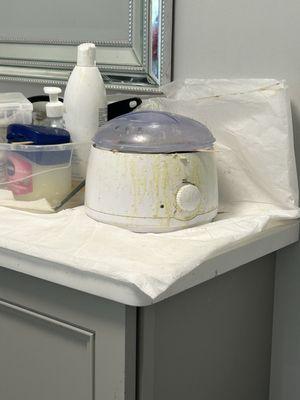 Other peoples hair stuck to the wax pot