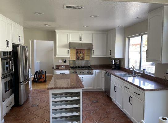 Kitchen cabinets went from stain oak wood to paint