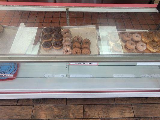 The donuts are not protected behind glass there out in the open for the FLIES, AND BUGS TO ENJOY.