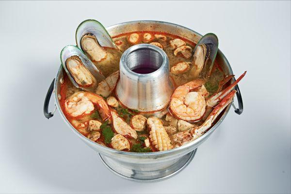 Po Tak - Spicy soup with seafood, mushroom with lemongrass, lime juice, and fresh chili.