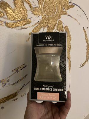 The WoodWick Diffuser in "Coastal Sunset" scent. It's the best ever!