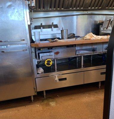 Look at that filthy towel on the grill prep area.