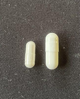 Capsule size difference-the one to the right is mostly fillers.