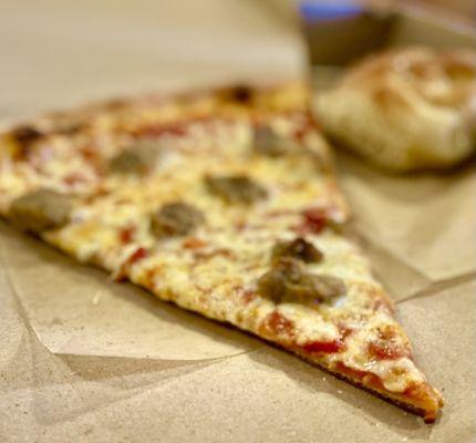 Cheese & Sausage slice with a Garlic Knot included by Sal's