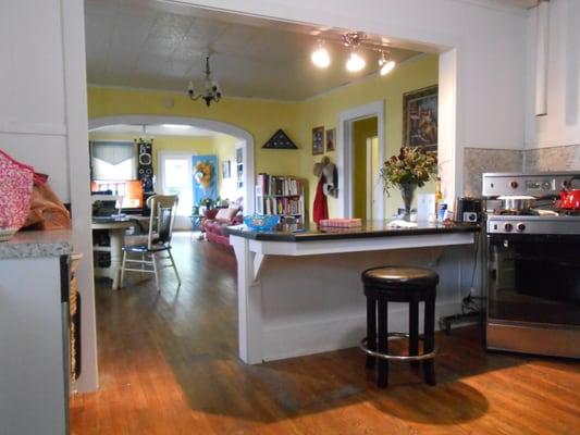 2015 Best NAHB 50+ Remodeled Project--opened wall to create roll-under wheelchair accessible workspace in kitchen and dining areas