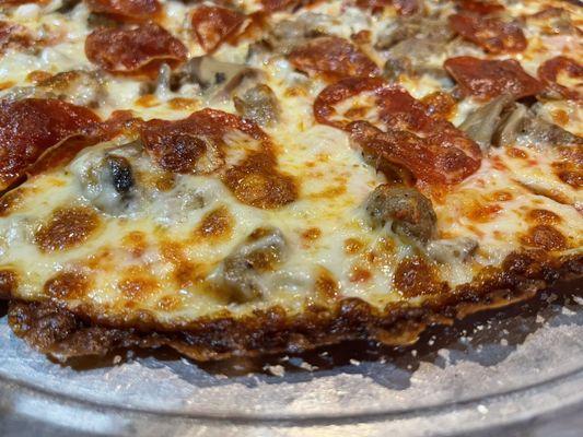 The crispy outer edge of pizza looked amazing.