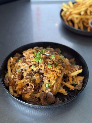 Dirty fries with our grilled pork!