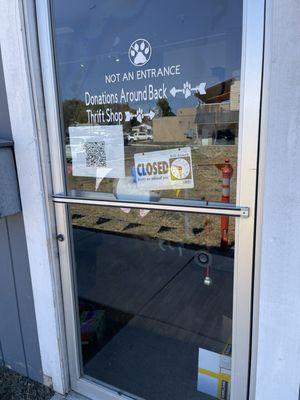 Door with hours and info