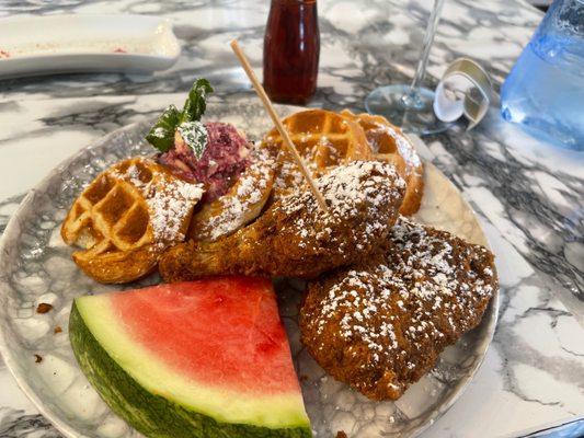 Chicken and waffles , deviled eggs trio and carmel chicken and biscuit