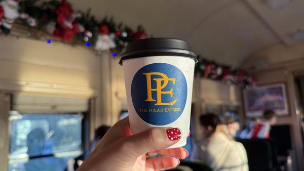 The hot chocolate in paper cup