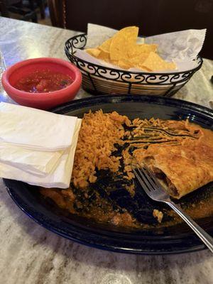 Steak burrito rice and beans, chips and salsa