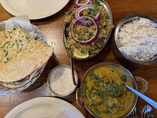 Coconut Korma, Chicken Biryani and Garlic Cheese Naan.