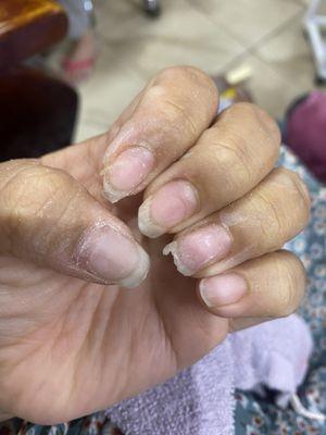 The Index and ring finger were the ones that needed the dip powder off. Instead of soaking the previous work was yanked. UNPROFESSIONAL.