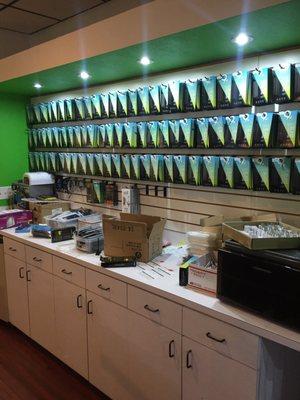 Their wall of screen protectors. I highly recommend buying one to save your phone!