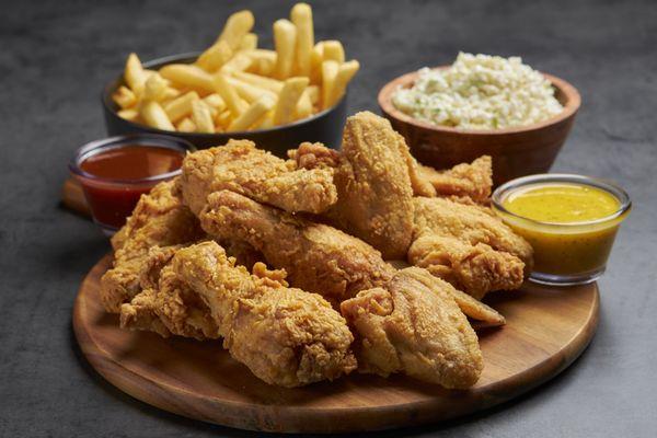 "Crunchy, savory, and oh-so-satisfying! Our golden fried chicken paired with a zesty coleslaw and crispy fries.