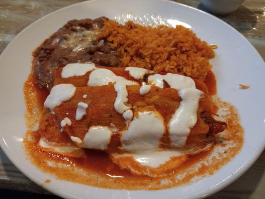 Two pork tamales with pinto beans and rice $16