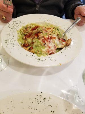 Grilled Chicken Caprese with Roasted Tomatoes and Mozzarella all over linguine in a Pesto Cream Sauce. Fuori dal mondo!