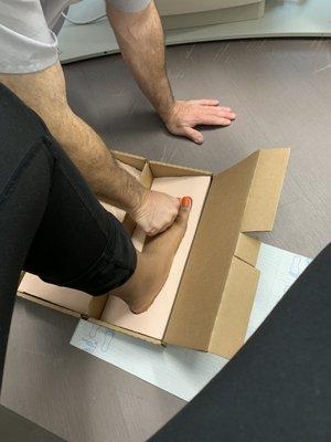 Dr. Russell doing custom orthotics