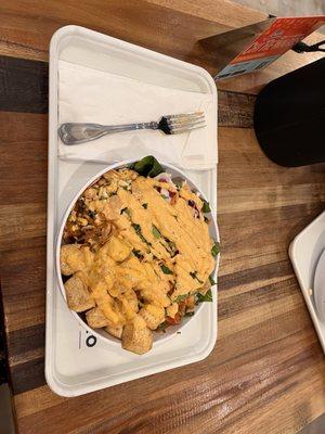 This is my tofu noodle bowl. Fresh tofu (if you go closer to closing time) and a GENEROUS pour of magic sauce. Eating like a queen! lol