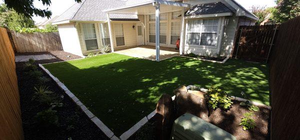 Stone edging, Patio cover, Synthetic Turf, Paver Patio, Rubber Mulch, Plants and Drainage.