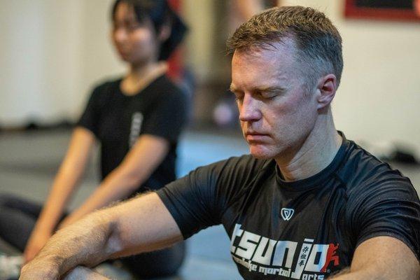 Students meditating. Students do this at the end of each class.