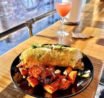 Veggie omelet with ham and sweet potato country potatoes.