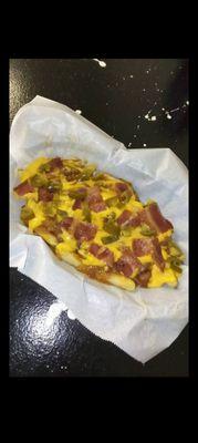 Loaded chilli cheese fries with crispy bacon and jalapenos