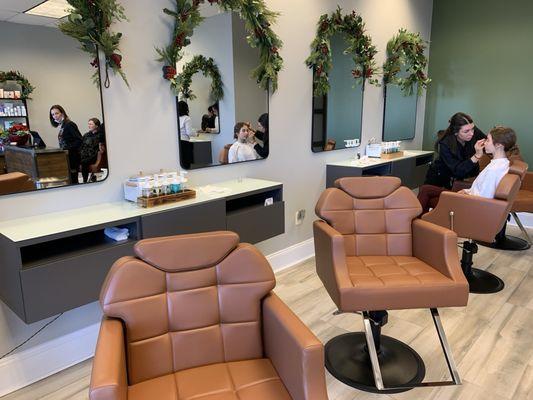 New location with several chairs in the front room.