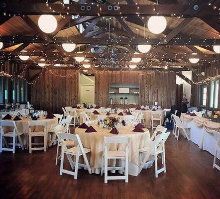 Chairs , tables and linens from Seaside . They also offer decoration with fabrics, lights etc