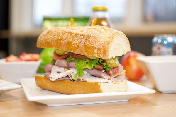 Dagwood-Sourdough Roll with Turkey, Roast Beef & Bacon topped with Roasted Bell Peppers, Lettuce, Tomato, Onion Pickles Mayo & Mustard *Cold