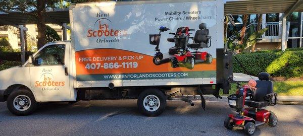 Four wheel mobility scooter rental Orlando, equipped with cup holder, cell phone holder, cell phone charger and more.