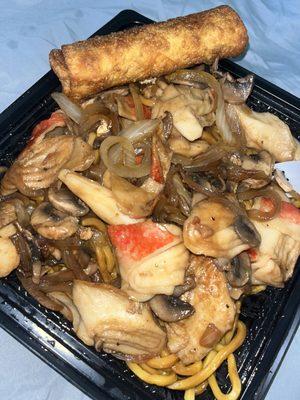 Crab, lo mein noodles, mushrooms, onions and and egg roll