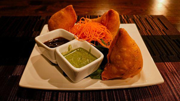 Vegetable Samosas + Chutneys: Crispy on the outside, saboteurs of hunger on the inside. Choose your dip, young Padawan.