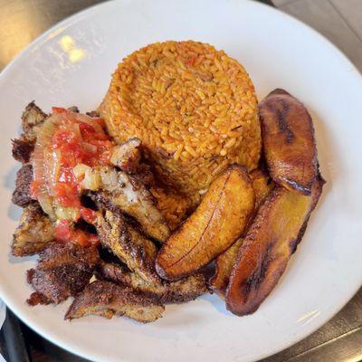 Weekend Steak Special with Jollof rice.