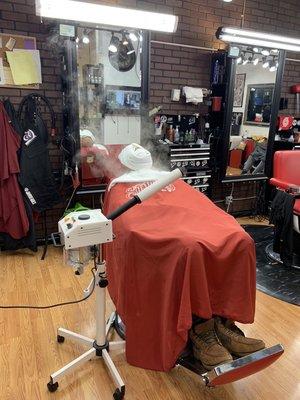 Hot towel shave and facial.