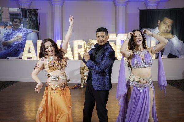 My husband with the belly dancers