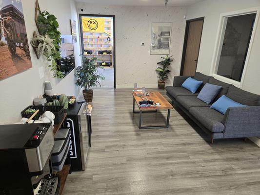 Comfortable waiting area with complimentary drinks and snacks