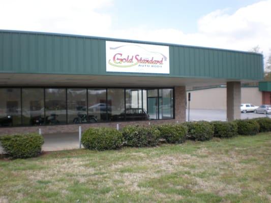 Showroom area where we keep a collection of vintage cars and motorcycles . Stop in and see us .