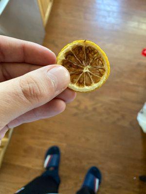 Lemon-Aid Tea with a old brown lemon why would anyone think its okay to put this in someones drink?