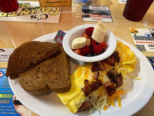 Meat omelette with wheat toast and fruit cup