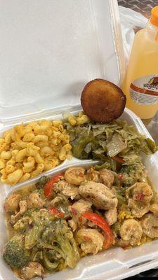 Chicken & shrimp over yellow rice Mac & cheese, cabbage, roll  Mango Lemonade