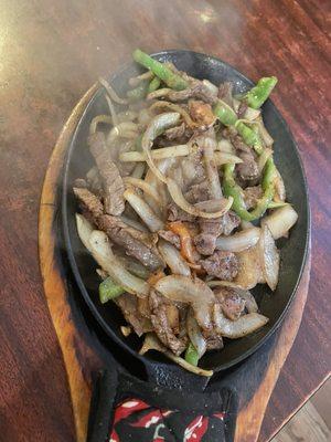 Sizzling steak fajitas