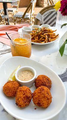 Crab Fritters, Bee Nectar Cocktail, Paloma Fries |Instagram @restaurant_aholic