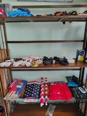 Tenemos cargadores para cellulares, Banderas Americanas, Ropa para ninos, sodas, jugos vebidas enerjeticas, Red bull y Monster.