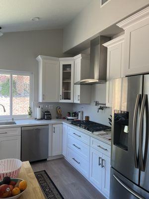 Kitchen, hallway, door w/trim... would've taken more from the foyer, but our house is a bit of a mess. lol
